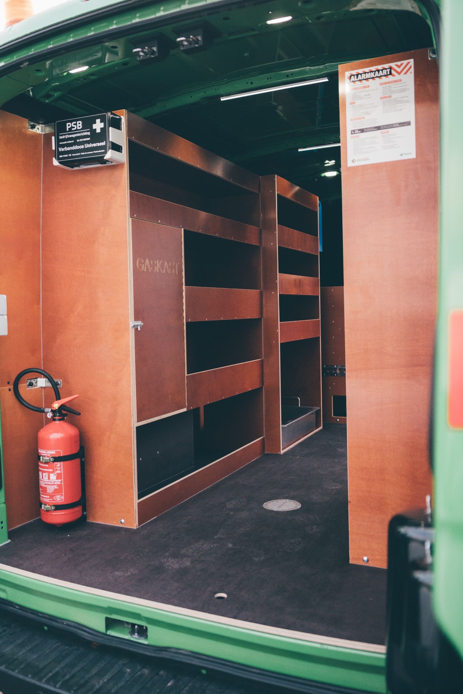 Custom cupboard unit in a converted work van