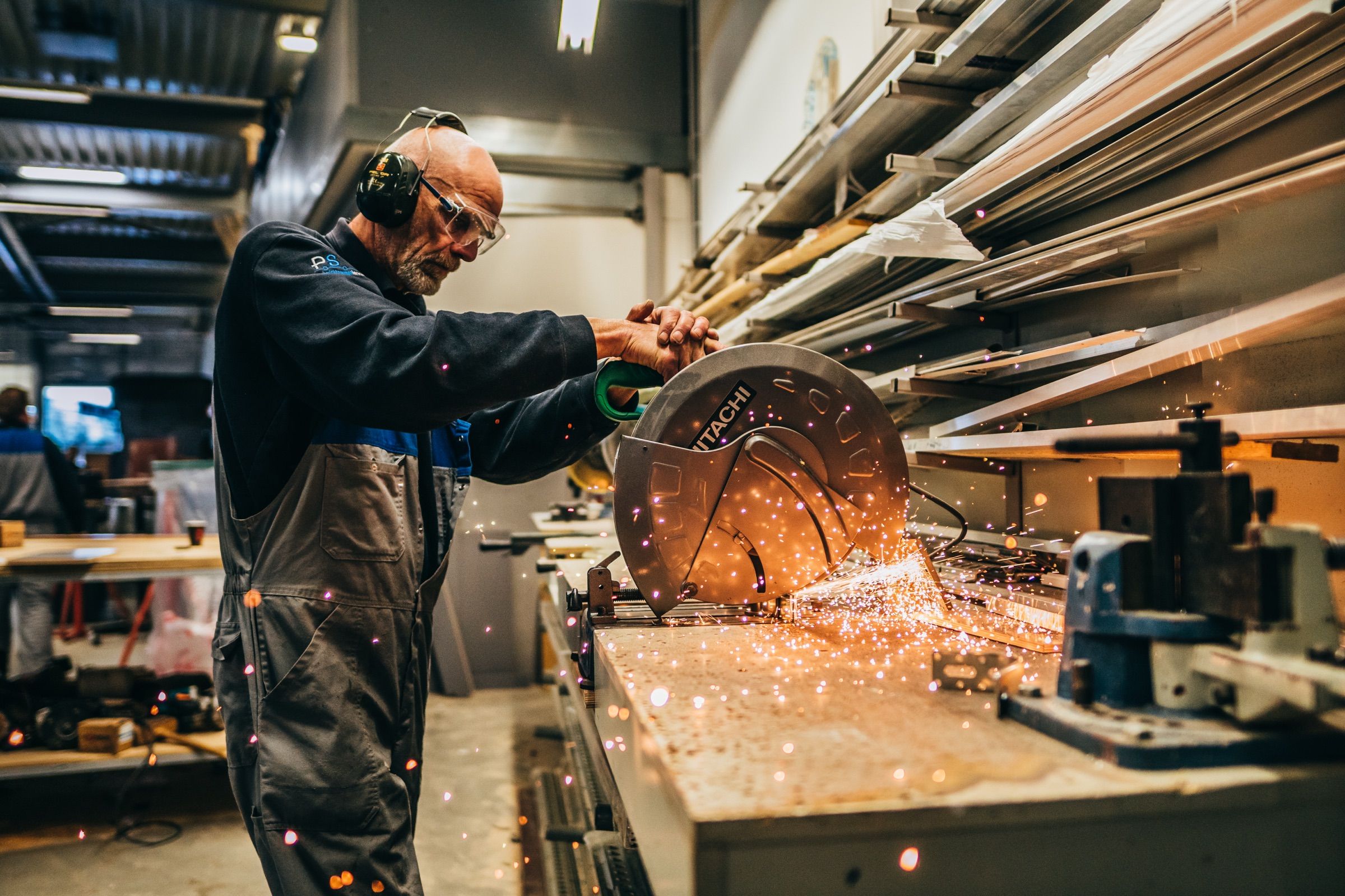 Technician at work amid flying sparks